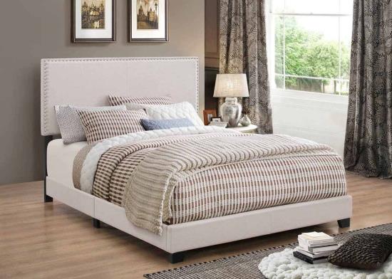 Boyd Eastern King Upholstered Bed with Nailhead Trim Ivory